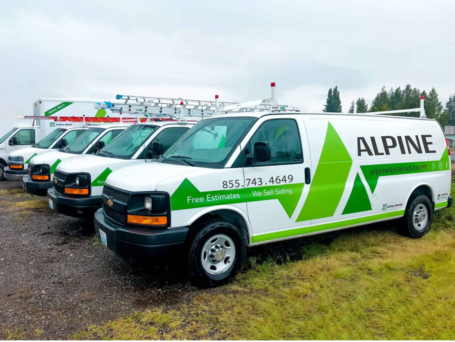 Alpine Exteriors professional van fleet with branded vehicles showcasing company presence in Orlando FL